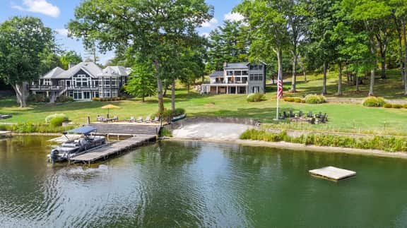 Lake Front • Private Beach • Deck & Dock • Golf