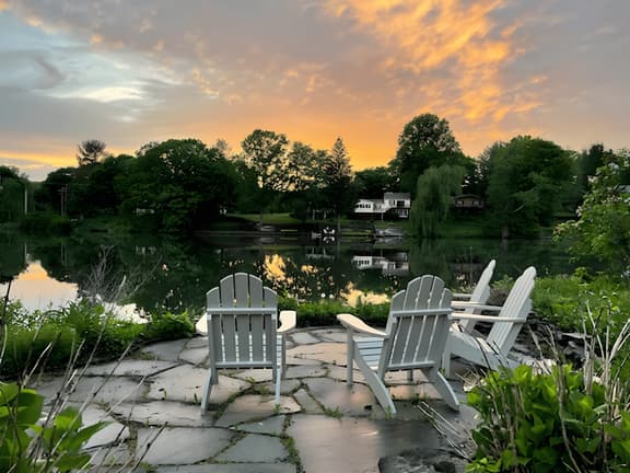 Lake Front Cottage with Sun Soaked Terraces